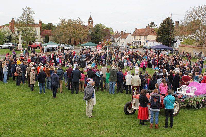 the village fete taking place at church end green